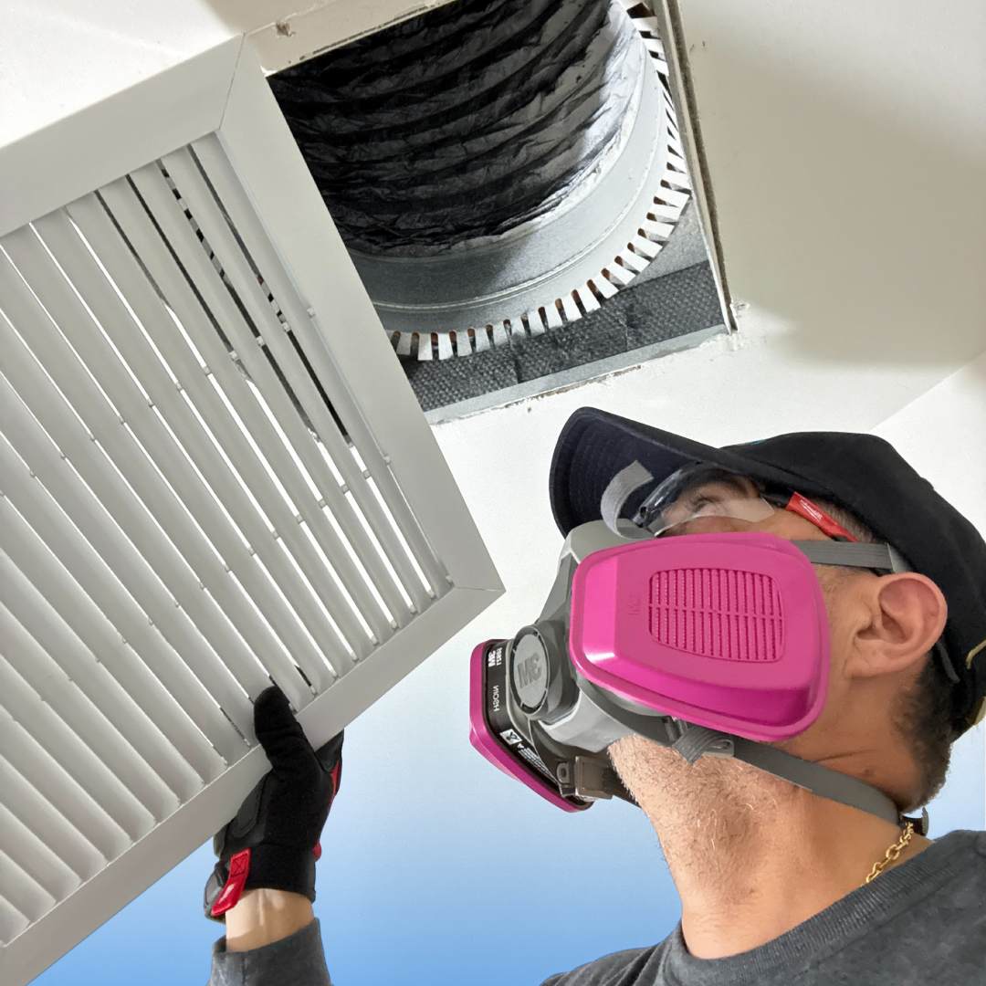 HVAC vent inspection and air duct cleaning by AirNova Cleaning Solutions technician in a residential home in Miami, Florida